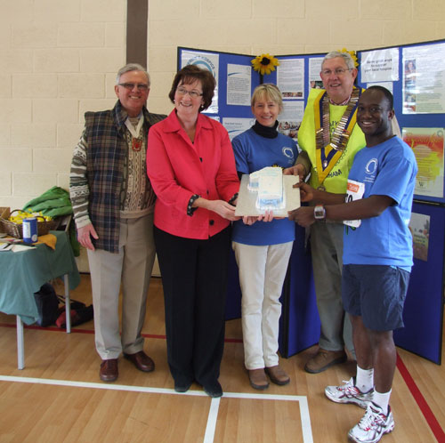 Vice-Chairman of Tandridge District Council, Alan Jones, Surrey County Councillor for Caterham Valley, Sally Marks, St. Catherine's Community Fundraiser, Rebecca Day, President of Caterham Round Table, Jim Burton and Conservative candidate for East Surrey, Sam Gyimah with the St. Catherine's Hospice first anniversary birthday cake. Vice-Chairman of Tandridge District Council, Alan Jones, Surrey County Councillor for Caterham Valley, Sally Marks, St. Catherine's Community Fundraiser, Rebecca Day, President of Caterham Round Table, Jim Burton and Conservative candidate for East Surrey, Sam Gyimah with the St. Catherine's Hospice first anniversary birthday cake.