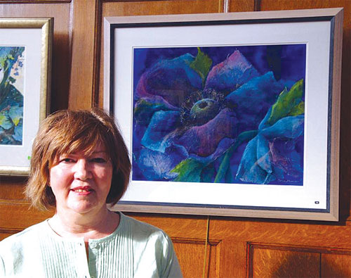 Winner of the David Curzon Price award, Stella Mance, with her painting '‘Blue Anenomes'.