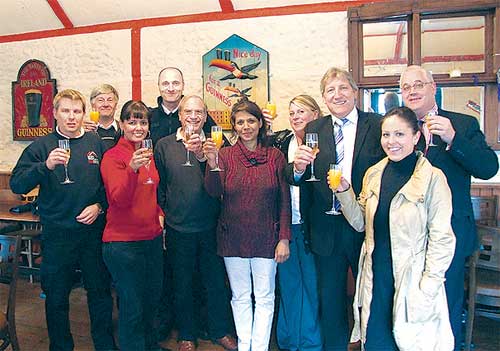 Raising their glasses to the new WBA: (From left) Vince Elgar, Brian Gale Roofing Warehouse Ltd., David Podd, C.S. Podd & Son Ltd., Rita Henry, Four Seasons Floral Design, PCSO Rupert Kelley, Derek Vivian, Abbey Brokers Ltd., Conservative District Councillor for Whyteleafe, Sakina Bradbury, Kellie MacDonald, Whyteleafe Travel Lodge, Mark Coote, Chairman of Whyteleafe FC, Sara Dominy, Commmercial Manager, Whyteleafe FC.
