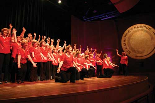 Surrey Harmony performing at Woldingham School in aid of St. Catherine's Hospice last May