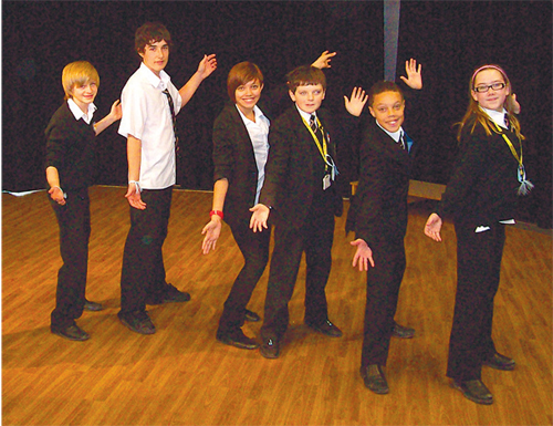 de Stafford pupils get the message across during their lively anti-bullying assembly.