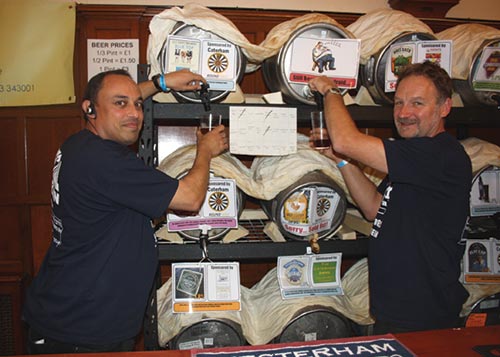 Event co-organisers, Glen O'Dwyer (left) and Barry Louvel behind the bar at the Beer Festival.